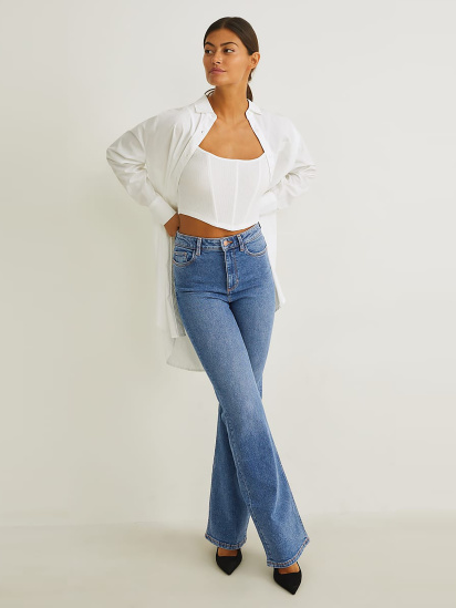 Расклешенные джинсы C&A модель 71877 — фото - INTERTOP