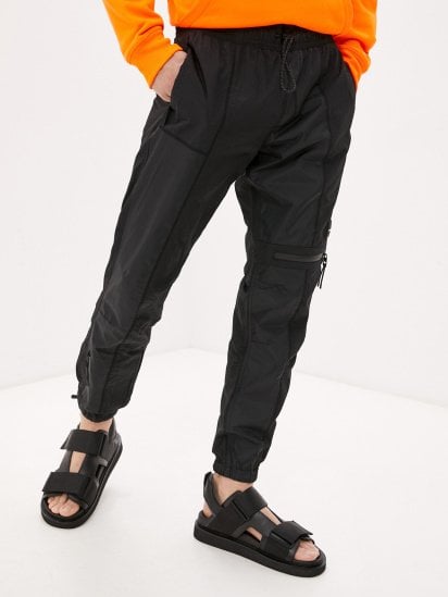 Штани спортивні Calvin Klein Jeans модель J30J317375_BEH — фото - INTERTOP