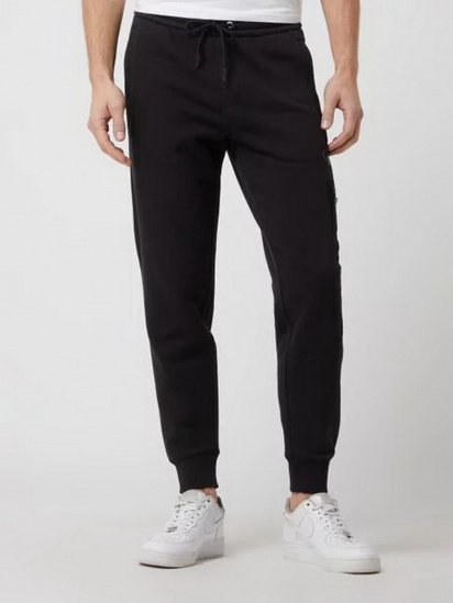 Штани спортивні Calvin Klein Jeans модель J30J319775_BEH — фото - INTERTOP