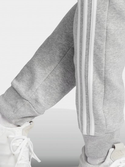 Штаны спортивные adidas Essentials Fleece 3-Stripes Tapered Cuff модель IJ6494 — фото 3 - INTERTOP