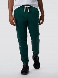 Зелений - Штани спортивні New Balance Essentials Fleece